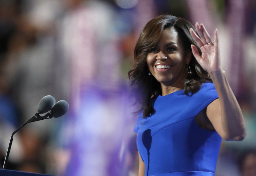 The speech of the United States First Lady Michelle Obama was as touching as it was moving for the audience at this year's Democratic National Committee. FLOTUS praised Hillary Clinton for the 2016 presidential race and brought up serious matters like police shootings and racism. Image Credit: Think Progress