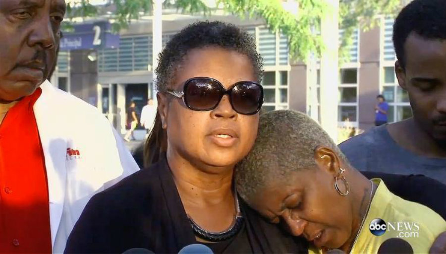 Wade's mother, pastor Jolinda Wade, consoled the victim's devastated mother, her sister Diann. Image Credit: Daily News