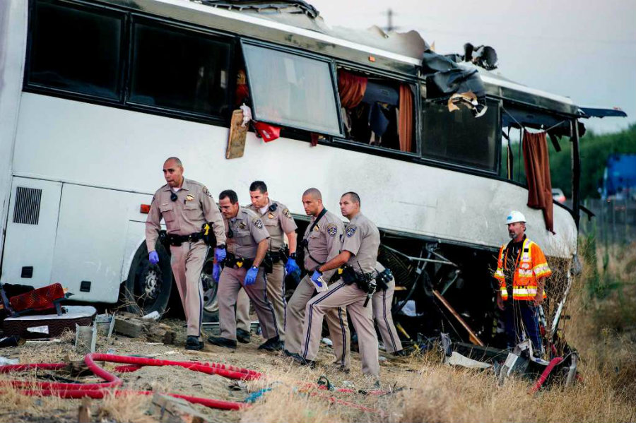 Californian authorities investigate the site of the crash on Interstate (#$/" to determine what happened and what could've caused the bus to crash in such aggresive manner. Image Credit: Chron