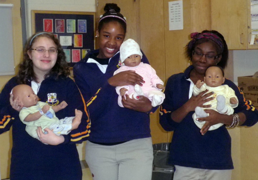 According to the study, taking care of the robot baby for a weekend could make teenage girls enjoy the challenge and the attention that comes with it. Photo credit: St. Aloysius Gonzaga Secondary School