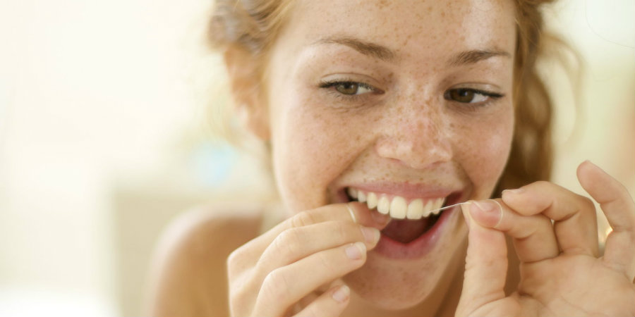 The U.S. Departments of Health and Human Services and Agriculture has issued the latest Dietary Guidelines for Americans, where the epidemiological effect of flossing was considered “fairly weak.” Photo credit: Getty / Kniel Synnatzschke