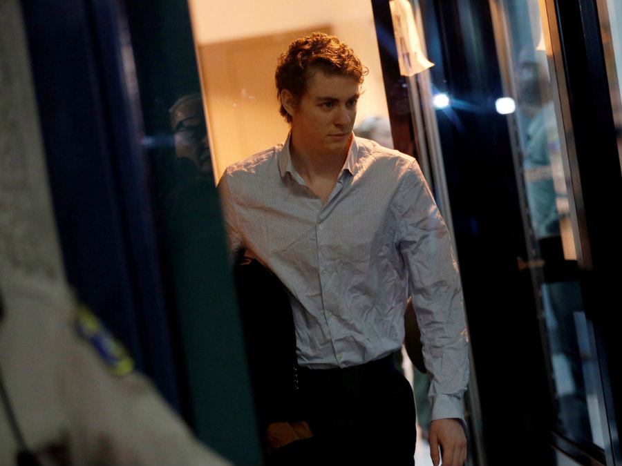 Brock Turner left the Santa Clara County jail wearing a white, long-sleeved shirt with a paper bag containing his belongings and a sports jacket under his arm. Photo credit: Reuters / Stephen Lam / Business Insider