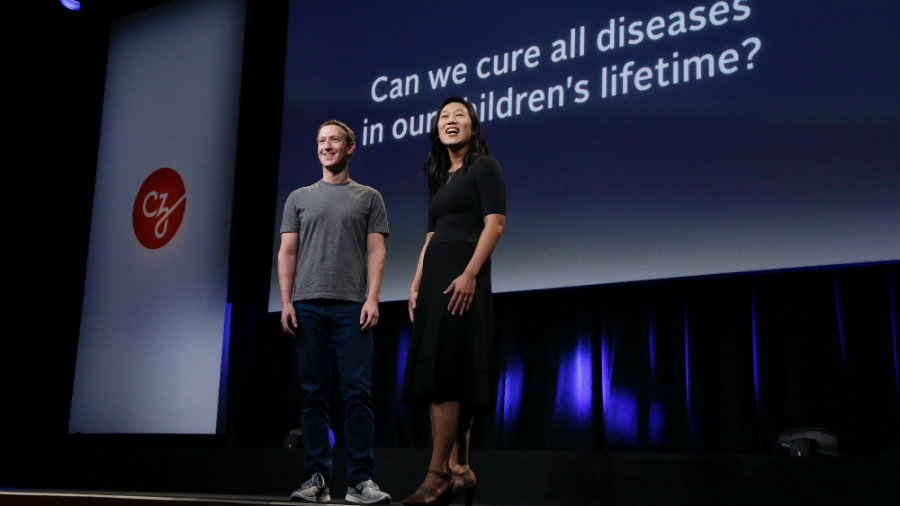 Zuckerberg and Chan introduced the new president of Chan-Zuckerberg Science, Dr. Cori Bargmann and made public they will give her $3 billion to fund efforts to cure all disease by 2100. Photo credit: AP Photo / Jeff Chiu / Quartz