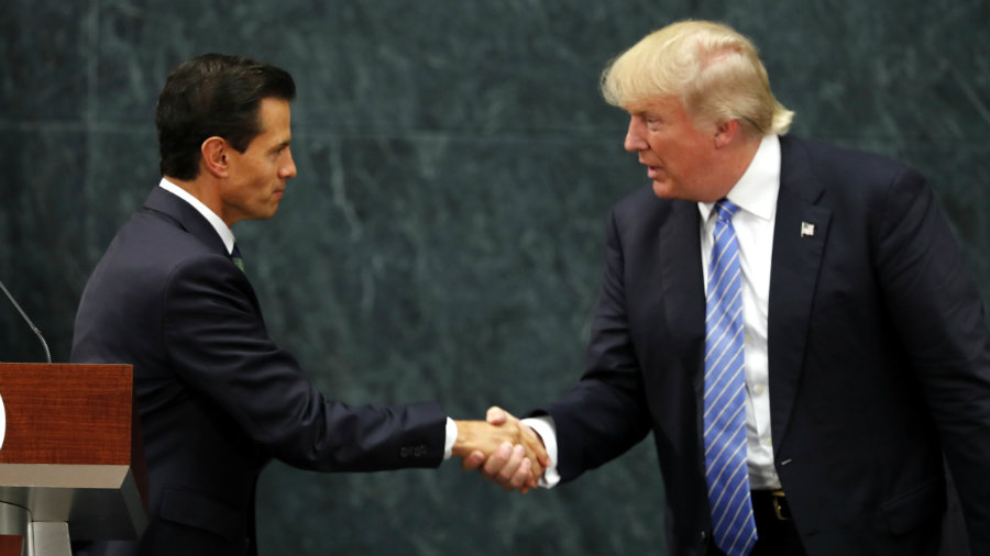 Trump flew to Mexico to meet with President Enrique Peña Nieto. Photo credit: AP Photo / Dario Lopez-Mills / Quartz