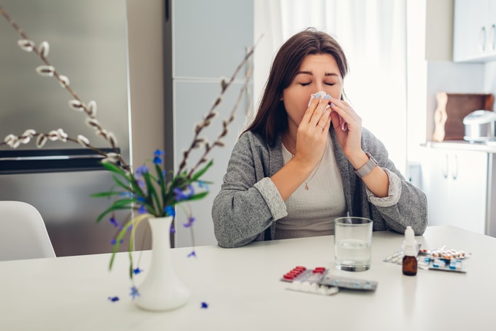 Woman in the Kitchen with Allergy